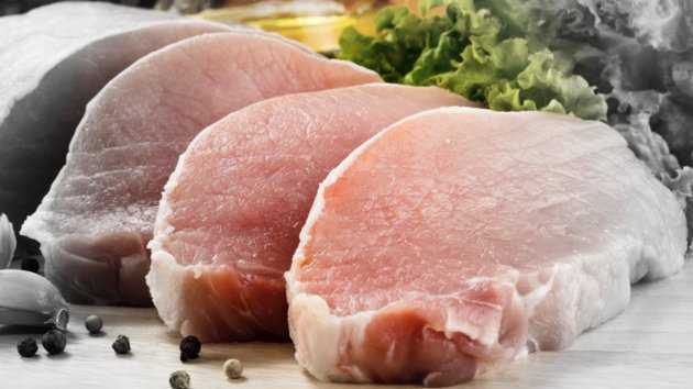 raw pork on cutting board